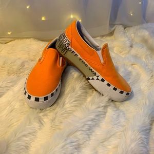 Orange Classic Platform Vans Slip-On.
